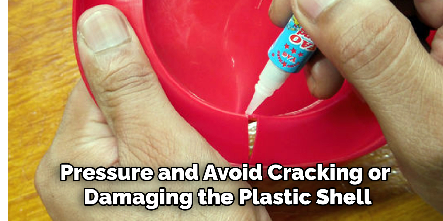 Pressure and Avoid Cracking or
 Damaging the Plastic Shell