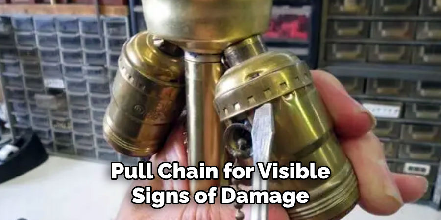  Pull Chain for Visible 
Signs of Damage 