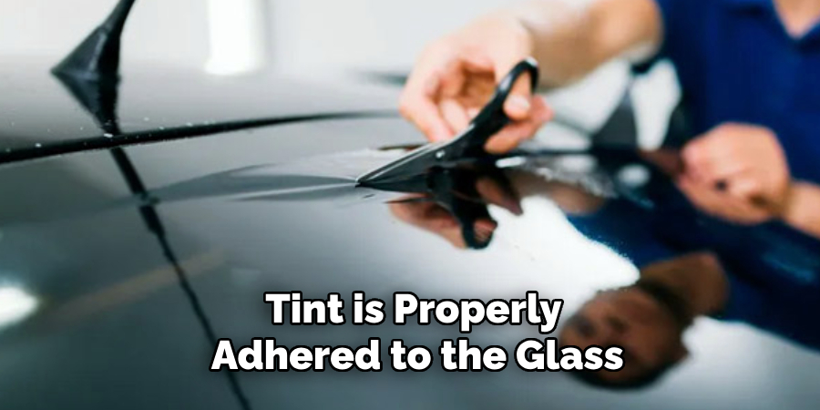 Tint is Properly
 Adhered to the Glass