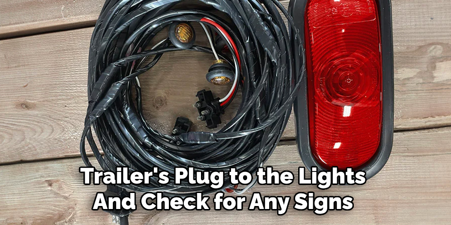 Trailer's Plug to the Lights 
And Check for Any Signs 