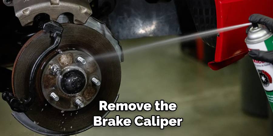 Remove the Brake Caliper