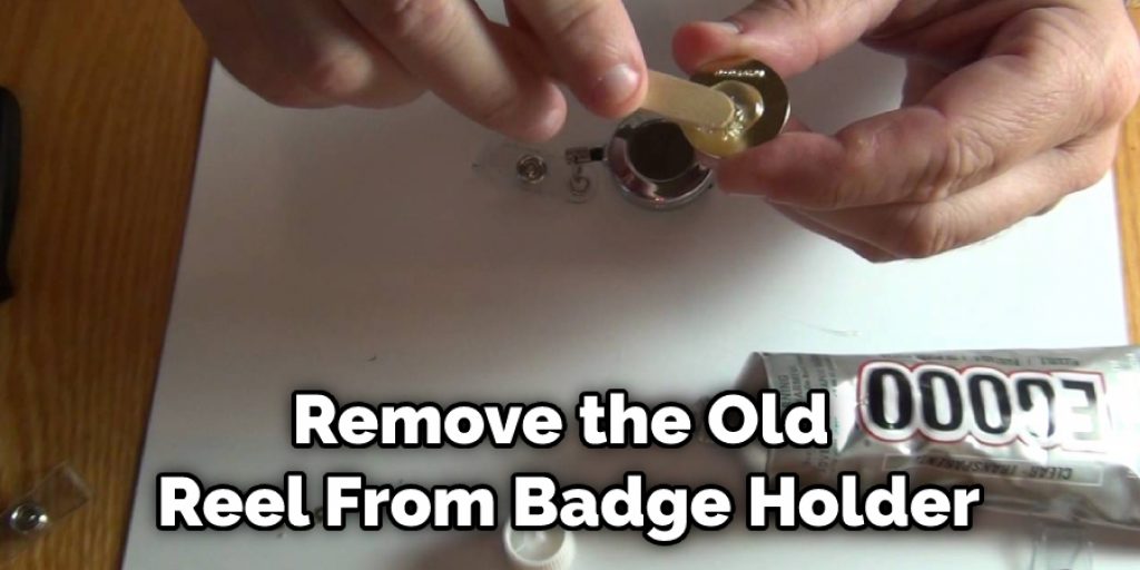 Remove the Old Reel From Badge Holder